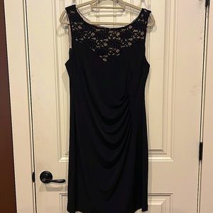 Black dressy dress w/sequins. Nude lining underneath. Has side gathers L side.